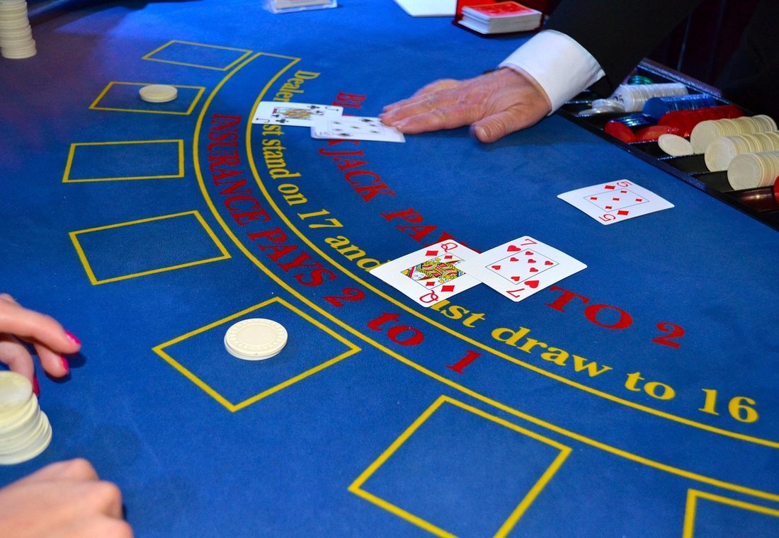 A dealer at a blackjack table